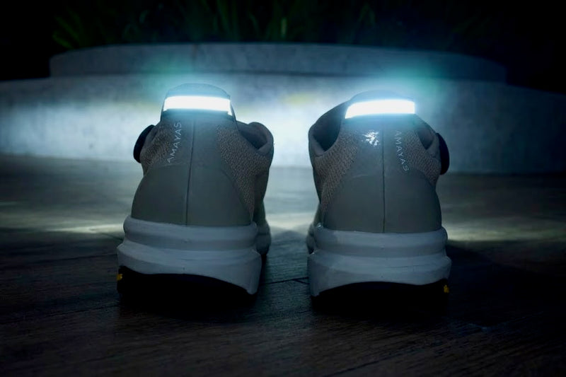 AMAYAS V1 shoe on track, AMAYAS reflective heel strip at night